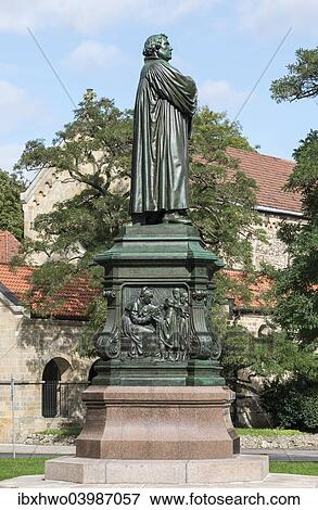 Stock Photo - "Luther Memorial, west side, relief of the young Luther, bronze, 1895, sculptor Adolf von Donndorf, renovated state in 2014, Eisenach, Thuringia, Germany, Europe". Fotosearch