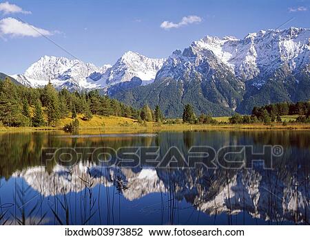 "Luttensee Lake in front of the Karwendel Range, near Mittenwald, Upper Bavaria, Bavaria, Germany, Europe" View Large Photo Image Stock Image - "Luttensee Lake in front of the Karwendel Range, near Mittenwald, Upper Bavaria, Bavaria, Germany, Europe". Fotosearch