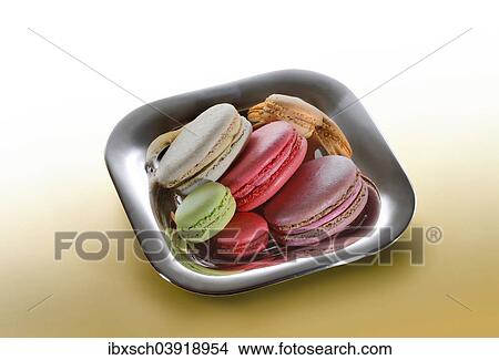 Macarons in a chrome dish View Large Photo Image Picture - Macarons in a chrome dish. Fotosearch