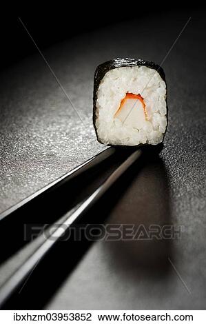 "Maki Sushi with surimi, chopsticks" View Large Photo Image Stock Image - "Maki Sushi with surimi, chopsticks". Fotosearch
