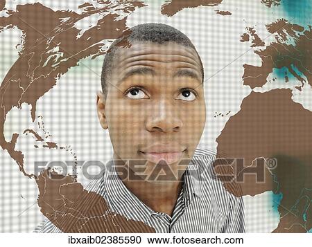 "Man, businessman, young, African-American, American, standing behind a glass wall with the world map, looking astonished" View Large Photo Image Stock Image - "Man, businessman, young, African-American, American, standing behind a glass wall with the world map, looking astonished". Fotosearch