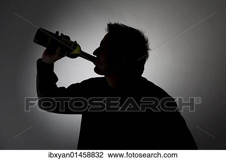 "Man drinking from a wine bottle, silhouette" View Large Photo Image Stock Image - "Man drinking from a wine bottle, silhouette". Fotosearch