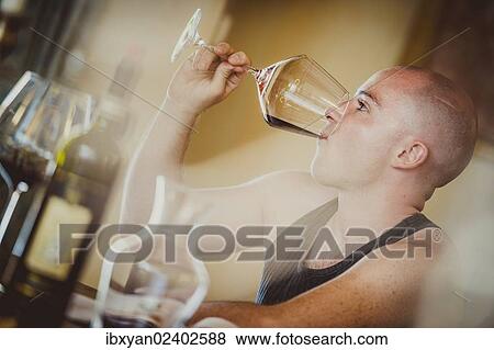 Man during wine tasting View Large Photo Image Stock Photo - Man during wine tasting. Fotosearch