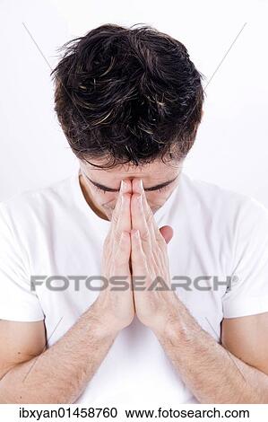 Stock Image - Man folding his hands. Fotosearch
