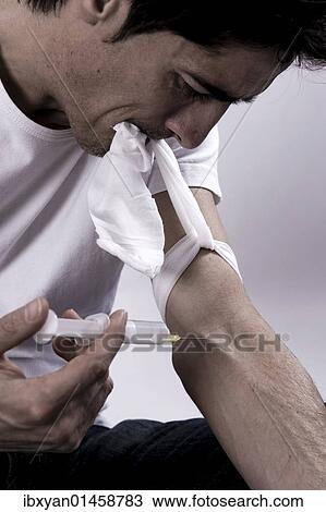 Man shooting up heroin View Large Photo Image Stock Image - Man shooting up heroin. Fotosearch