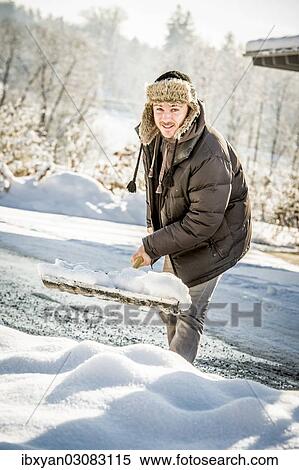 Man shovelling snow View Large Photo Image Stock Photography - Man shovelling snow. Fotosearch