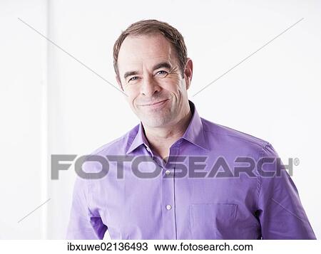 Stock Image - "Man smiling, portrait". Fotosearch