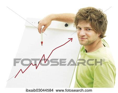Man standing in front of a flip chart with a rising rate View Large Photo Image Picture - Man standing in front of a flip chart with a rising rate. Fotosearch