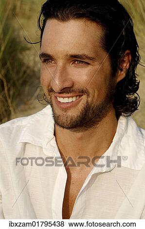 "Man wearing a white shirt, portrait" View Large Photo Image Stock Photo - "Man wearing a white shirt, portrait". Fotosearch