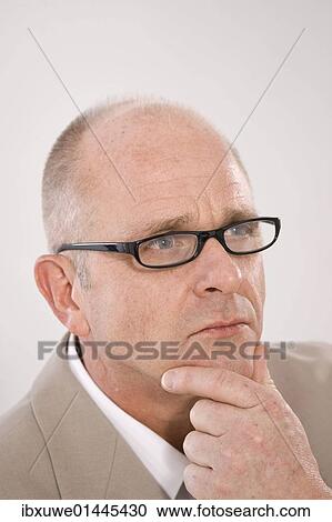 Stock Image - Man wearing glasses. Fotosearch