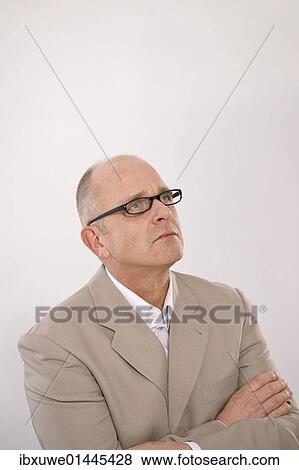 Man wearing glasses View Large Photo Image Stock Photo - Man wearing glasses. Fotosearch