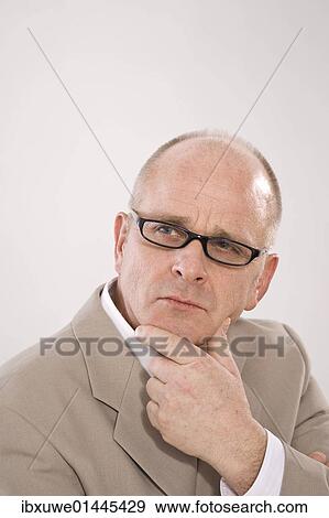 Man wearing glasses View Large Photo Image Stock Photo - Man wearing glasses. Fotosearch