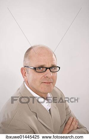 Man wearing glasses View Large Photo Image Stock Photography - Man wearing glasses. Fotosearch