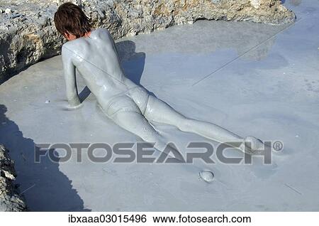 "Man with a mud-covered body, at the Kuyalnik mud health spa, Kuyalnik Estuary, Odessa, Odessa Oblast, Ukraine, Europe" View Large Photo Image Stock Photograph - "Man with a mud-covered body, at the Kuyalnik mud health spa, Kuyalnik Estuary, Odessa, Odessa Oblast, Ukraine, Europe". Fotosearch