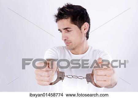 Man with handcuffs View Large Photo Image Picture - Man with handcuffs. Fotosearch