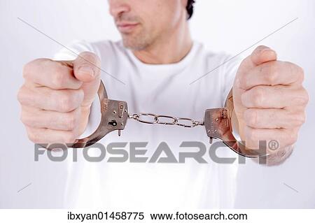 Man with handcuffs View Large Photo Image Stock Photography - Man with handcuffs. Fotosearch