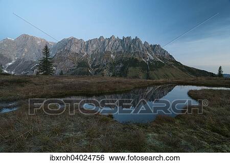 "Mandlwande in the morning with reflection, left Hochkonig, Salzburg, Austria, Europe" View Large Photo Image Stock Photograph - "Mandlwande in the morning with reflection, left Hochkonig, Salzburg, Austria, Europe". Fotosearch