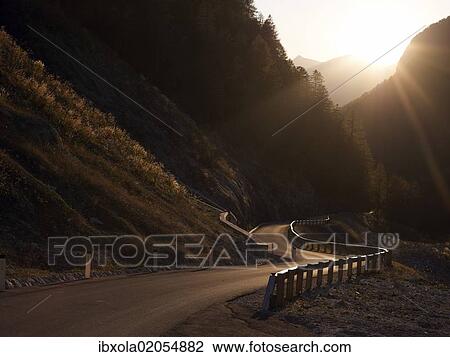 Stock Image - "Mangart Pass, highest road in Slovenia, at sunset overlooking the Julian Alps, Triglav National Park, Slovenia, Europe". Fotosearch