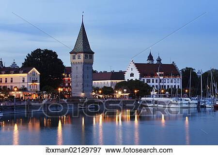 "Mangturm or Mangenturm tower near the harbour at dusk, Lindau on Lake Constance, Swabia, Bavaria, Germany, Europe, PublicGround, Europe" View Large Photo Image Stock Photo - "Mangturm or Mangenturm tower near the harbour at dusk, Lindau on Lake Constance, Swabia, Bavaria, Germany, Europe, PublicGround, Europe". Fotosearch