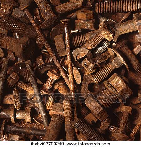 Stock Photo - Many rusty nuts and bolts. Fotosearch