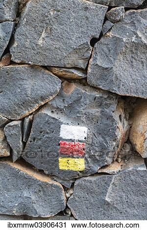 Marker for hikers on a rock View Large Photo Image Stock Image - Marker for hikers on a rock. Fotosearch