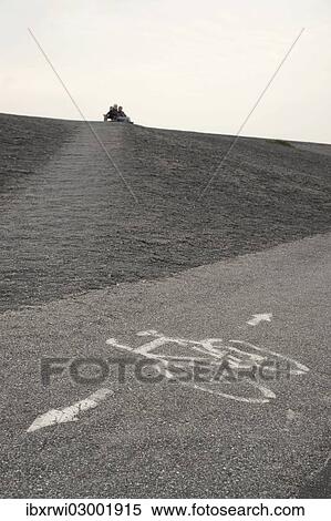 "Marking on the bicycle lane at the dyke of St. Peter-Ording, St. Peter-Ording, St. Peter-Ording, Eiderstedt, North Frisia, Schleswig-Holstein, Germany, Europe" View Large Photo Image Stock Photography - "Marking on the bicycle lane at the dyke of St. Peter-Ording, St. Peter-Ording, St. Peter-Ording, Eiderstedt, North Frisia, Schleswig-Holstein, Germany, Europe". Fotosearch