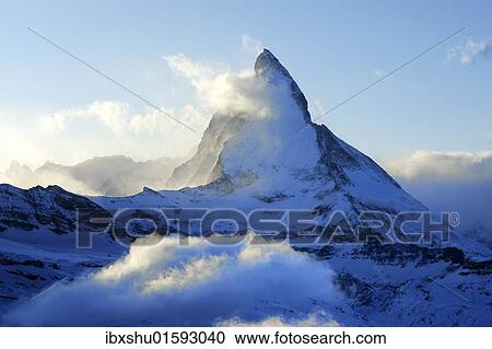 "Matterhorn, east wall, veiled with clouds, Zermatt, Valais, Switzerland, Europe" View Large Photo Image Stock Image - "Matterhorn, east wall, veiled with clouds, Zermatt, Valais, Switzerland, Europe". Fotosearch