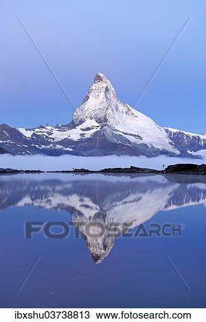"Matterhorn reflected in Lake Stellisee at dusk, Valais Alps, Canton of Valais, Switzerland, Europe" View Large Photo Image Stock Image - "Matterhorn reflected in Lake Stellisee at dusk, Valais Alps, Canton of Valais, Switzerland, Europe". Fotosearch