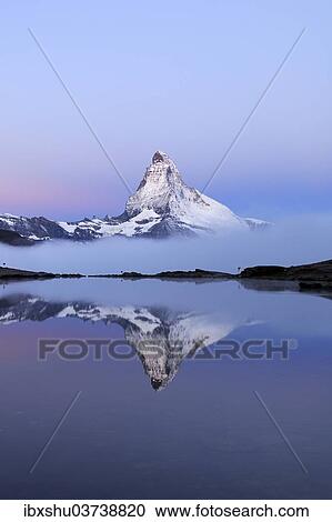"Matterhorn reflected in Lake Stellisee at dusk, Valais Alps, Canton of Valais, Switzerland, Europe" View Large Photo Image Stock Image - "Matterhorn reflected in Lake Stellisee at dusk, Valais Alps, Canton of Valais, Switzerland, Europe". Fotosearch