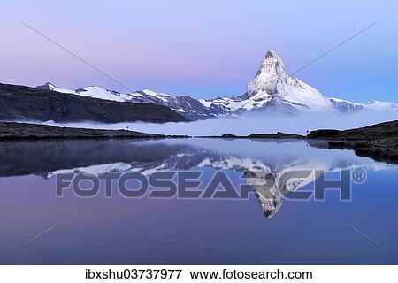 "Matterhorn reflected in Lake Stellisee at dusk, Zermatt, Canton of Valais, Switzerland, Europe" View Large Photo Image Stock Photo - "Matterhorn reflected in Lake Stellisee at dusk, Zermatt, Canton of Valais, Switzerland, Europe". Fotosearch