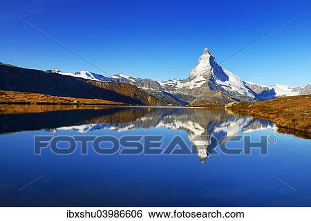Stock Photograph - "Matterhorn reflected in lake Stellisee, Valais Alps, Canton of Valais, Zermatt, Switzerland, Europe". Fotosearch
