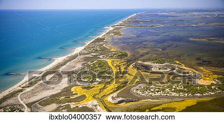 "Mediterranean coast, brackish water area of? Çï? Çïthe Etang de Melegal, Le Grau-du-Roi, Camargue, Languedoc-Roussillon, France, Europe" View Large Photo Image Stock Photo - "Mediterranean coast, brackish water area of? Çï? Çïthe Etang de Melegal, Le Grau-du-Roi, Camargue, Languedoc-Roussillon, France, Europe". Fotosearch