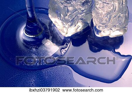 Melting ice cubes beside the stem of a glass View Large Photo Image Stock Image - Melting ice cubes beside the stem of a glass. Fotosearch
