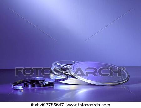 Stock Photo - Metal movie film canister with a film reel. Fotosearch