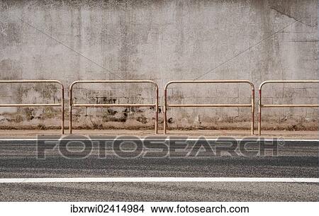 "Metal railing in front of a concrete wall, Ferreries, Menorca, Balearic Islands, Spain, Europe" View Large Photo Image Picture - "Metal railing in front of a concrete wall, Ferreries, Menorca, Balearic Islands, Spain, Europe". Fotosearch