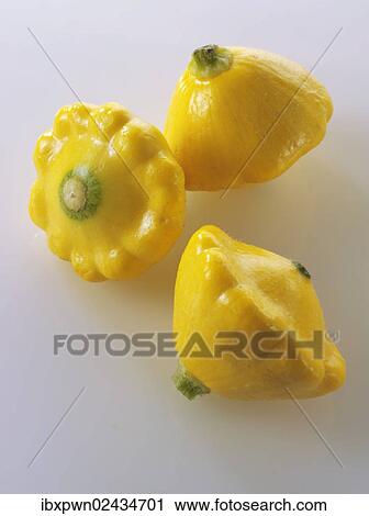 Stock Image - Mini yellow Petit Pan squashes. Fotosearch