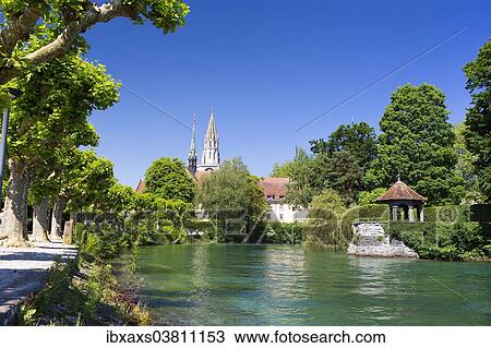 Stock Image - "Minster of Our Lady with Lake Constance in the front and the Pavilion of Dominicans Island, Konstanz, Baden-Wurttemberg, Germany, Europe". Fotosearch