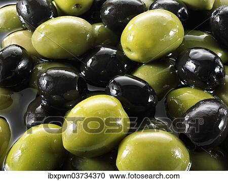 Mixed black and green olives View Large Photo Image Stock Image - Mixed black and green olives. Fotosearch