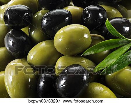 Mixed black and green olives View Large Photo Image Stock Photo - Mixed black and green olives. Fotosearch