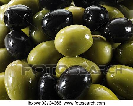 Mixed black and green olives View Large Photo Image Stock Photograph - Mixed black and green olives. Fotosearch