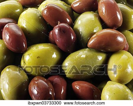 Stock Image - Mixed green and kalamata olives. Fotosearch