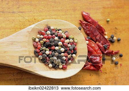 Mixed peppercorns on a wooden spoon View Large Photo Image Stock Image - Mixed peppercorns on a wooden spoon. Fotosearch