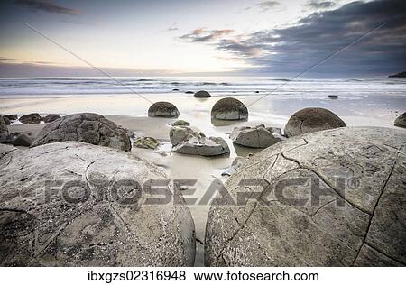 "Moeraki Boulders, geological feature, round rock balls, Coastal Otago, Moeraki, South Island, New Zealand, Oceania" View Large Photo Image Stock Photo - "Moeraki Boulders, geological feature, round rock balls, Coastal Otago, Moeraki, South Island, New Zealand, Oceania". Fotosearch