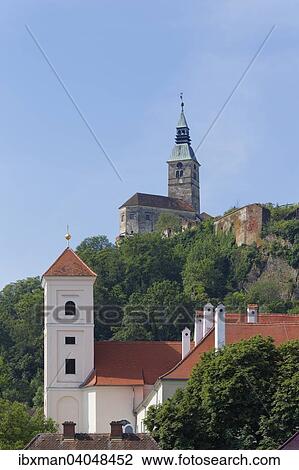 "Monastery church and Burg Gussing castle, Stremtal valley, Southern Burgenland, Burgenland, Austria, Europe" View Large Photo Image Stock Image - "Monastery church and Burg Gussing castle, Stremtal valley, Southern Burgenland, Burgenland, Austria, Europe". Fotosearch