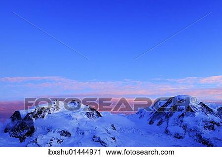 "Monte Rosa Mountains with the highest mountain in Switzerland, Pointe Dufour, red evening light, Zermatt, Valais, Switzerland, Europe" View Large Photo Image Stock Image - "Monte Rosa Mountains with the highest mountain in Switzerland, Pointe Dufour, red evening light, Zermatt, Valais, Switzerland, Europe". Fotosearch