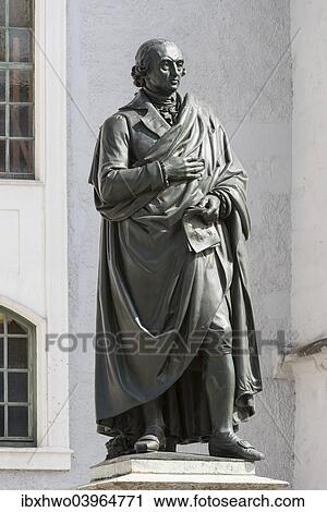 Stock Image - "Monument to Herder, 1850, Herderplatz square in front of Herderkirche Church, bronze by sculptor Ludwig Schaller, Weimar, Thuringia, Germany, Europe". Fotosearch
