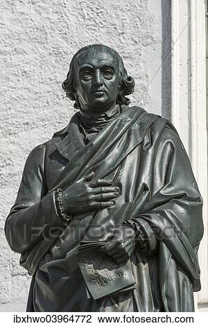 Stock Image - "Monument to Herder, 1850, Herderplatz square in front of Herderkirche Church, bronze by sculptor Ludwig Schaller, Weimar, Thuringia, Germany, Europe". Fotosearch