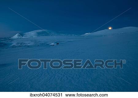 "Moonset in the wintry Fjell, Dovrefjell- Sunndalsfjella National Park, Norway, Europe" View Large Photo Image Stock Image - "Moonset in the wintry Fjell, Dovrefjell- Sunndalsfjella National Park, Norway, Europe". Fotosearch