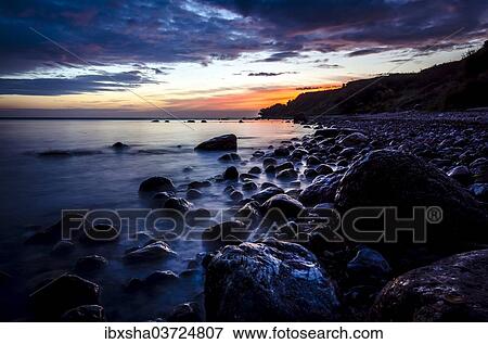 "Morning atmosphere at the Baltic Sea, surf washing around rocks, Timmendorfer Strand, Niendorf, East Holstein, Schleswig-Holstein, Germany, Europe" View Large Photo Image Stock Photo - "Morning atmosphere at the Baltic Sea, surf washing around rocks, Timmendorfer Strand, Niendorf, East Holstein, Schleswig-Holstein, Germany, Europe". Fotosearch
