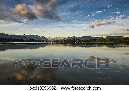 "Morning atmosphere, Riegsee Lake and Murnau with Mt Zugspitze, Upper Bavaria, Bavaria, Germany, Europe" View Large Photo Image Stock Photo - "Morning atmosphere, Riegsee Lake and Murnau with Mt Zugspitze, Upper Bavaria, Bavaria, Germany, Europe". Fotosearch